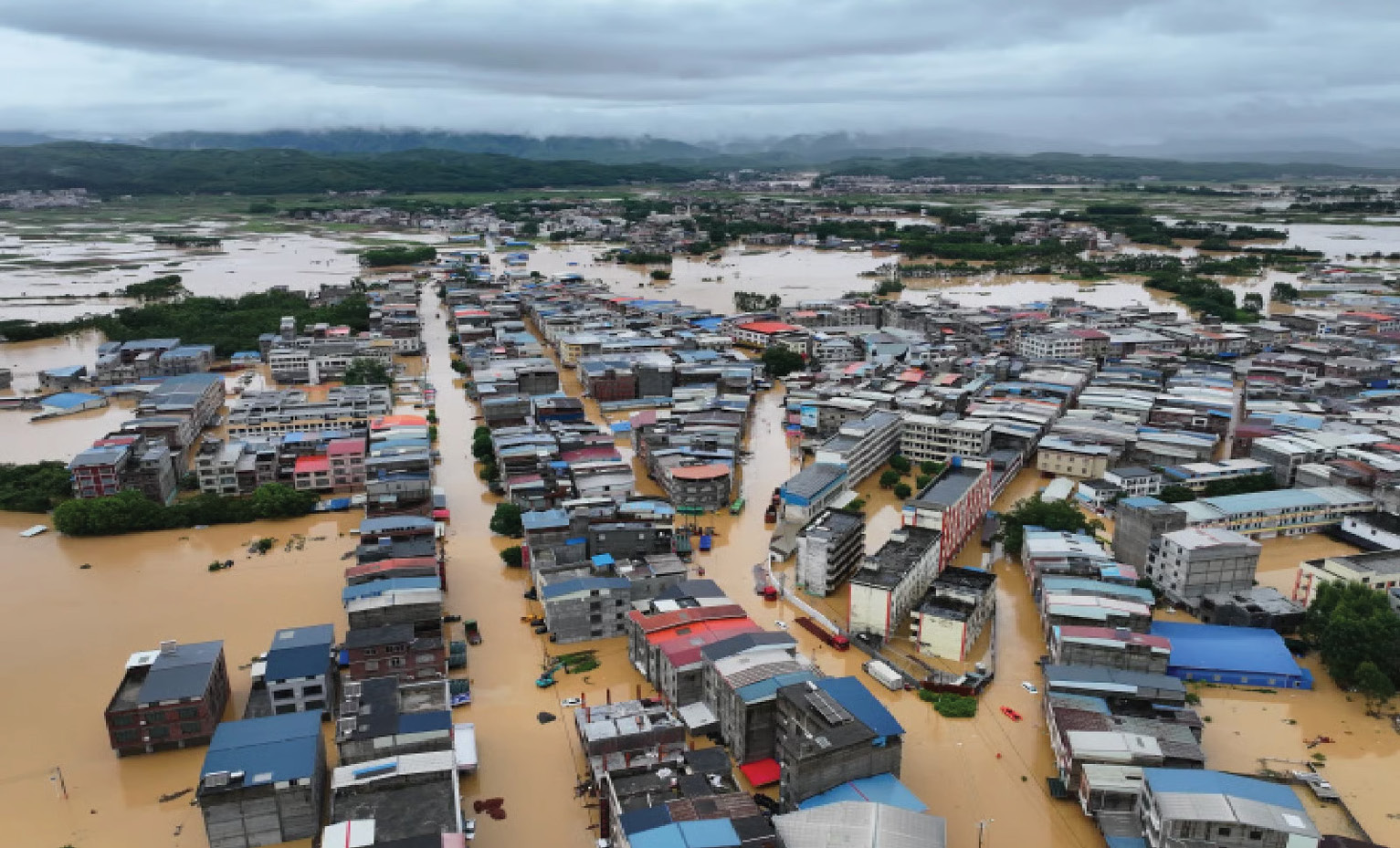 Rescuers search for missing in China storms after 100,000 evacuated