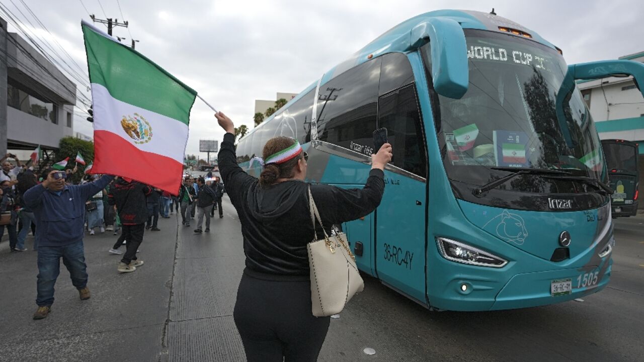 ‘Iran, Iran!’ Iranian World Cup squad serenaded on return home