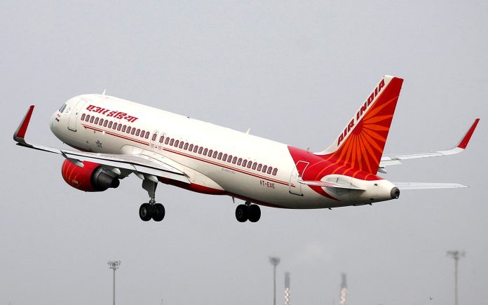 FILE PHOTO: An Air India Airbus A320 aircraft takes off from the Sardar Vallabhbhai Patel International Airport in Ahmedabad