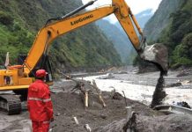 Nepal and China resume flood rescue after lake threat eases, death toll tops 500